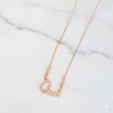 Gold Queen name pendant necklace with zircon stones and delicate chain for women