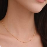 Delicate gold beaded chain necklace for women minimalist elegant neck jewelry worn on neck