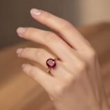 Elegant oval ruby color stone gold ring with classic prong setting for women