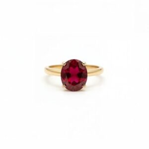 Elegant oval ruby color stone gold ring with classic prong setting for women