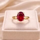Elegant oval ruby color stone gold ring with classic prong setting for women